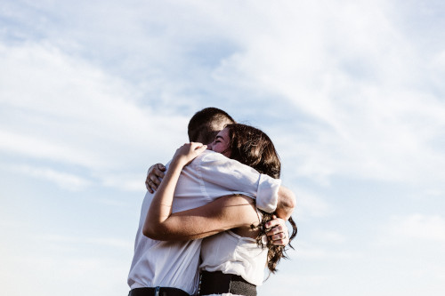 christian couple hugging