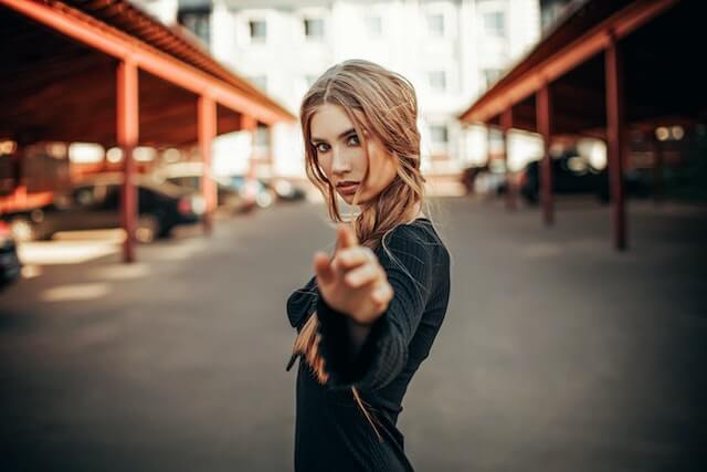 blonde breathtaking polish girl pointing at the camera 