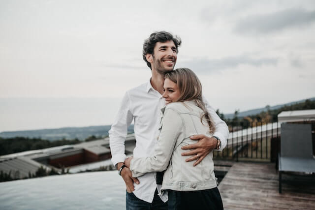 Young couple hugging and ready to settle down. 