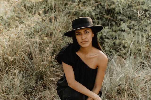 Latina with hat.