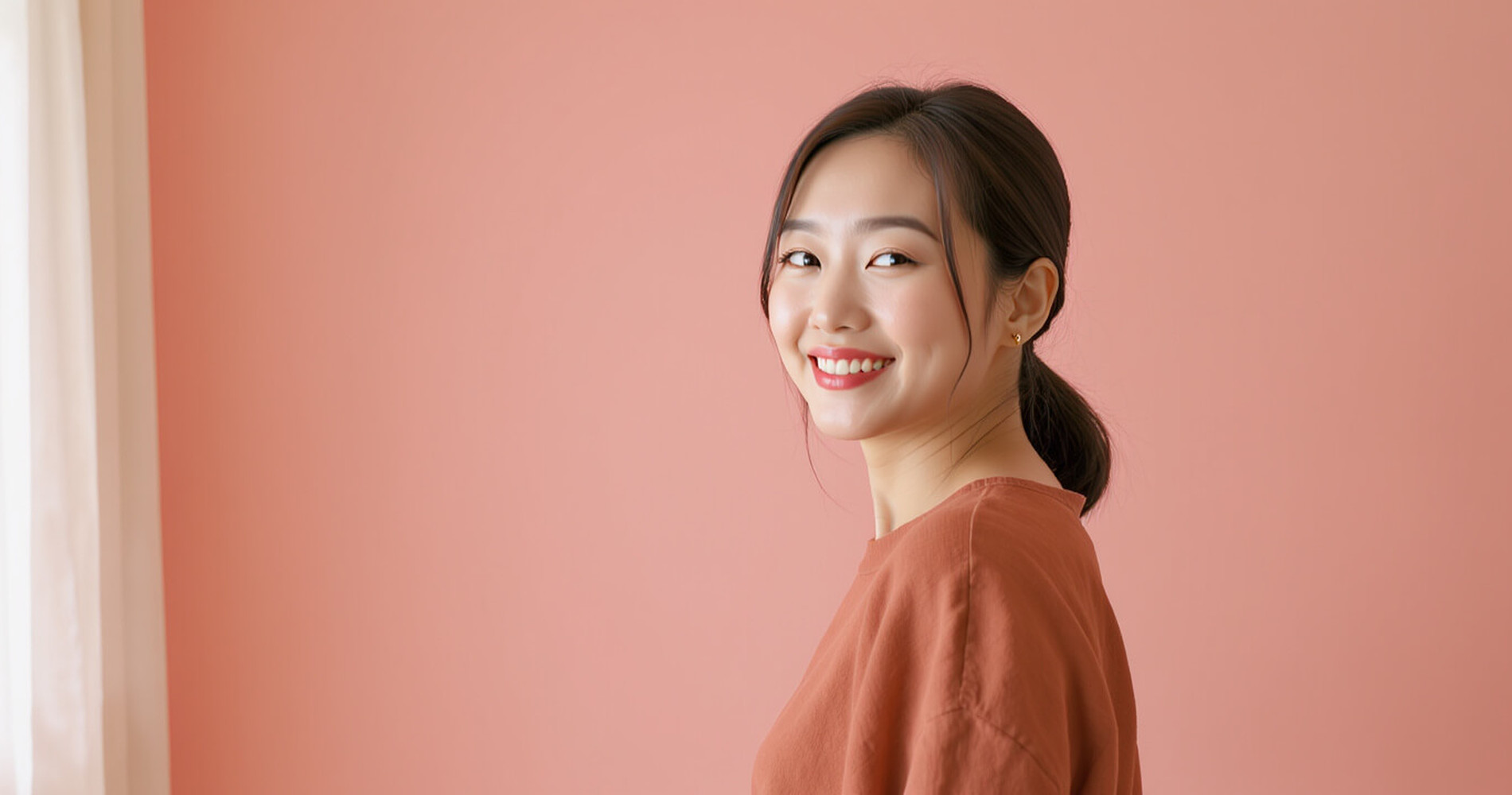 Confident Chinese woman smiling in daylight